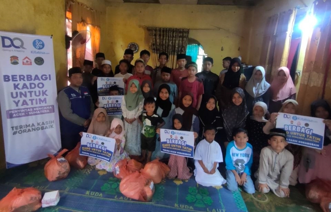 DQ Berkolaborasi dengan Kitabisa Salurkan Kado untuk 47 Anak Yatim di Desa Banai, Aceh Tamiang